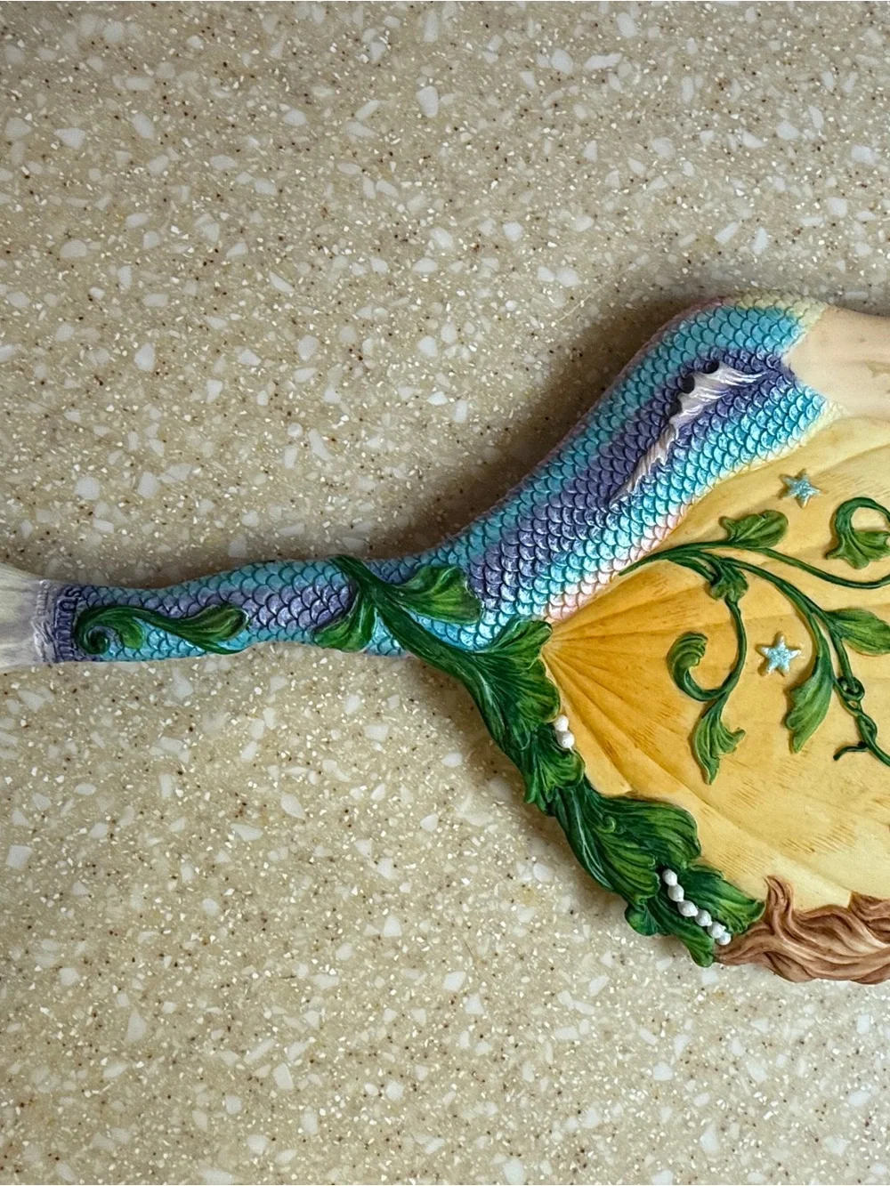 Mermaid Scale Hand Mirror with Green Leaf Accents